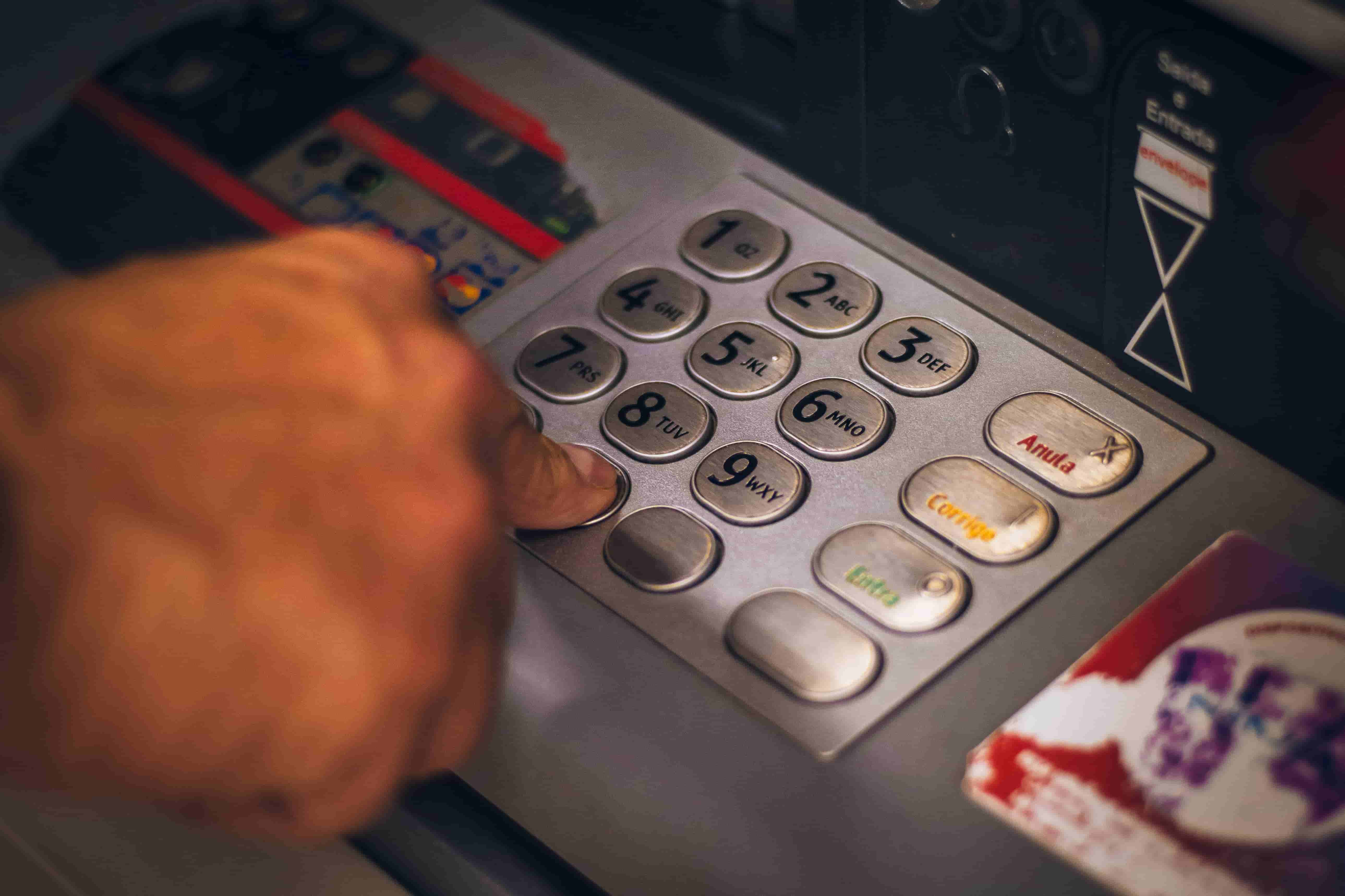 Image of bank machine being used