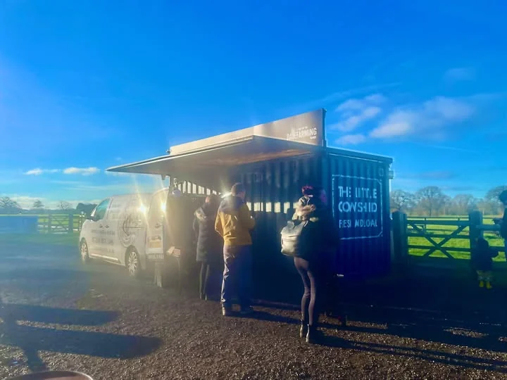 Beartown Coffee Company serving customers beside The Little Cow Shed during the fundraiser